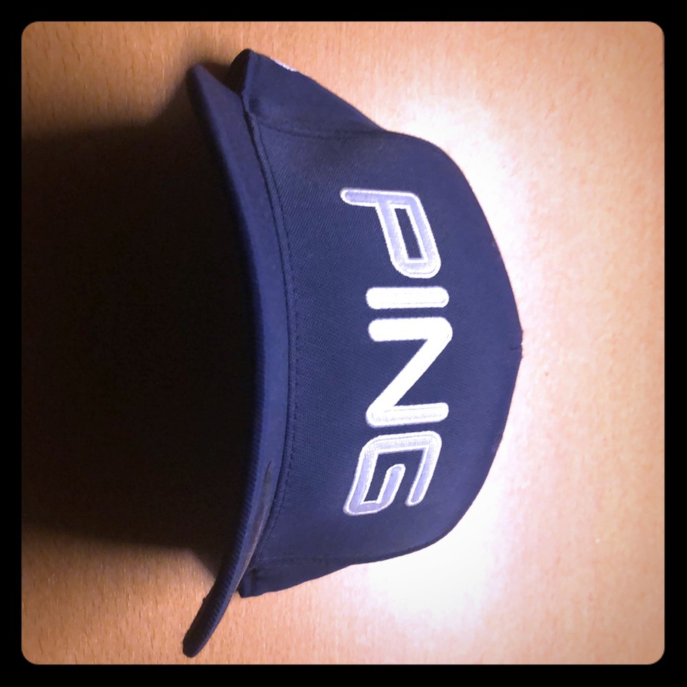 Navy blue Ping FlexFit hat.